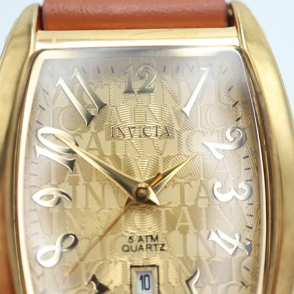 Invicta vintage gold